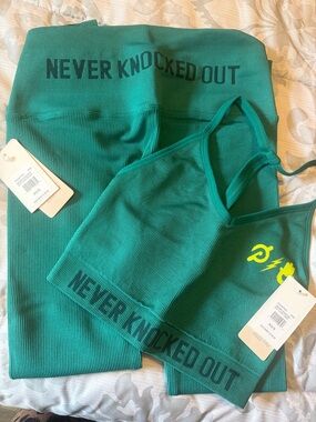 (NWT) Peloton! NEVER KNOCKED OUT! Teal Ribbed Racerback Sports Bra with Yellow